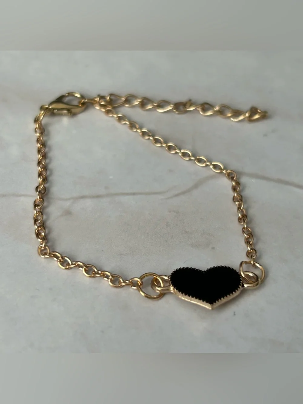 Gold Chain Bracelet with Black Heart Charm